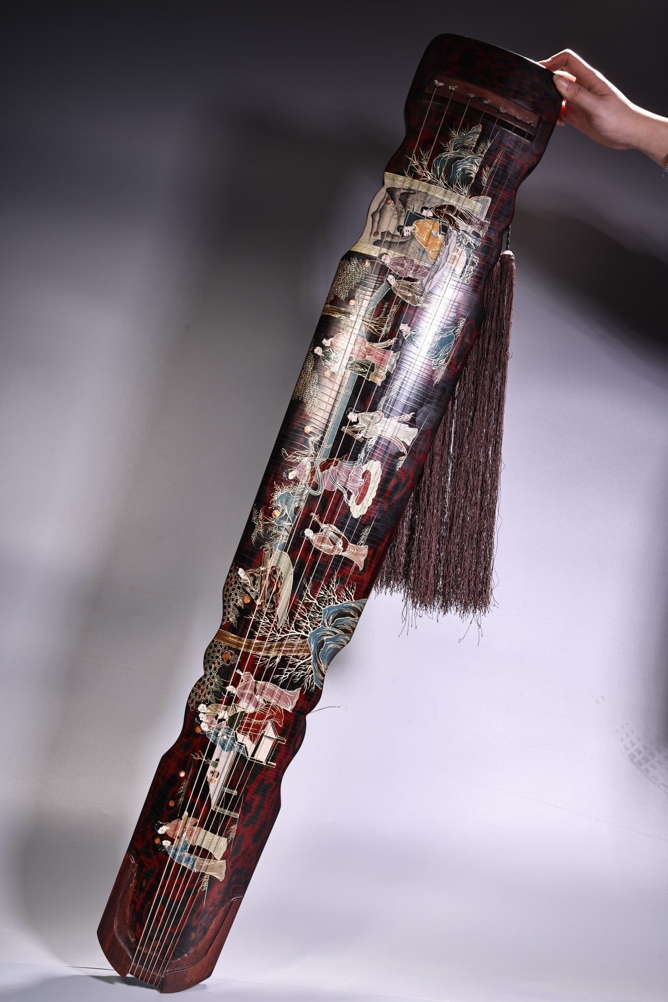 An Exquisite Black Lacquer Painted Gold Character and Story Pattern with poem Musical instrument: An Exquisite Black Lacquer Painted Gold Character and Story Pattern with poem Musical instrument Qing Dynasty, China Size:125cmx20cm Weight:2000g (The Dimensions Of All Batches Are Manually Measured.I