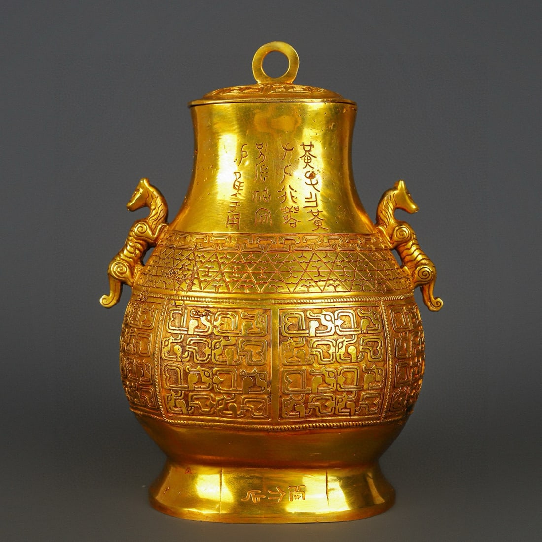 An Exquisite Gilt Bronze With Inscription Double-Ears Vase: An Exquisite Gilt Bronze With Inscription Double-Ears Vase Han Dynasty, China Size:22cmx32cm Weight:3580g (The Dimensions Of All Batches Are Manually Measured.If You Need More Detailed Information, Pl