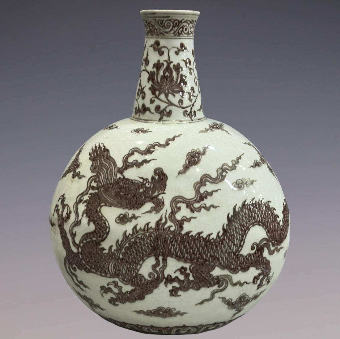 An Exquisite Underglaze-Red Lotus Pattern Dragon Pattern Vase: An Exquisite Underglaze-Red Lotus Pattern Dragon Pattern Vase Ming Dynasty, China Size:45cm (The Dimensions Of All Batches Are Manually Measured.If You Need More Detailed Information, Please Contact O