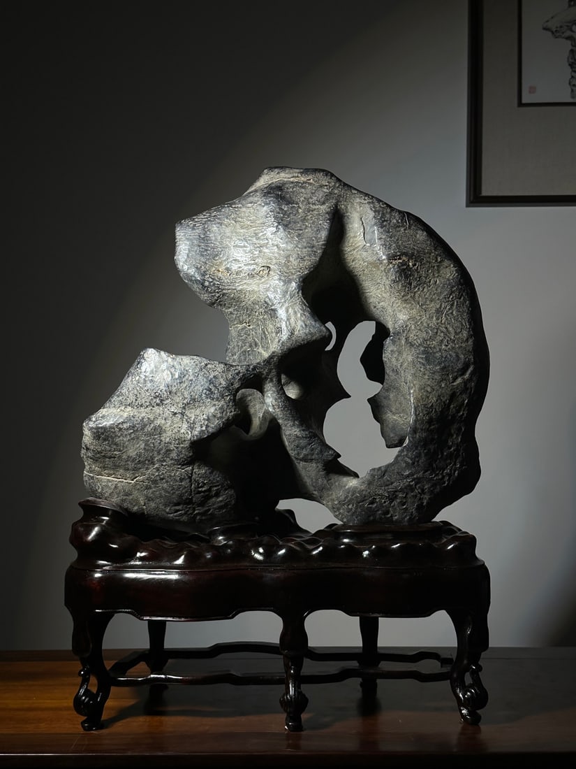An Exquisite Taihu Stone Ornament: An Exquisite Taihu Stone Ornament Qing Dynasty, China Size:66cmx46cmx25cm (The Dimensions Of All Batches Are Manually Measured.If You Need More Detailed Information, Please Contact Our Customer Servic