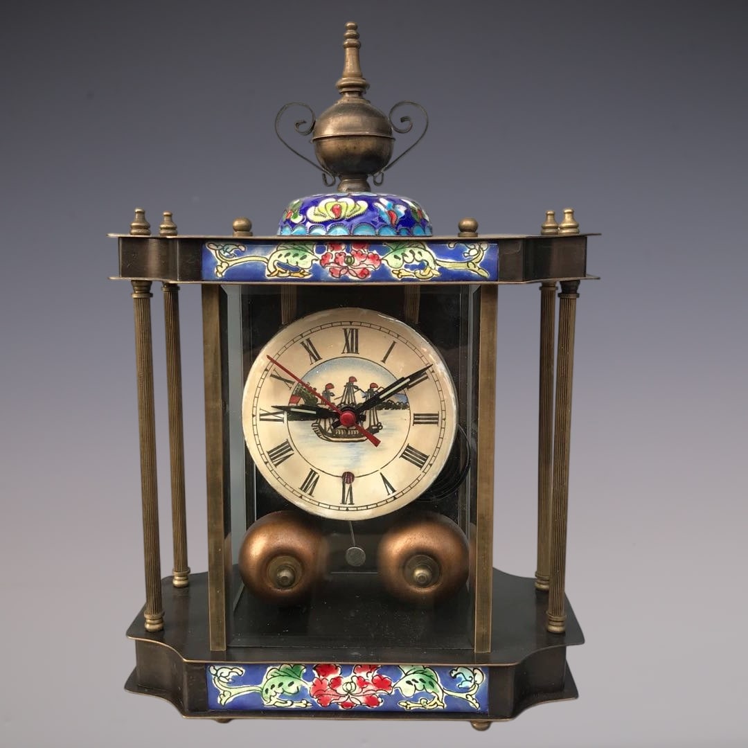 An Exquisite Bronze Lotus Pattern Clock: An Exquisite Bronze Lotus Pattern Clock Qing Dynasty, China Size:20cmx9cmx28cm (The Dimensions Of All Batches Are Manually Measured.If You Need More Detailed Information, Please Contact Our Customer S