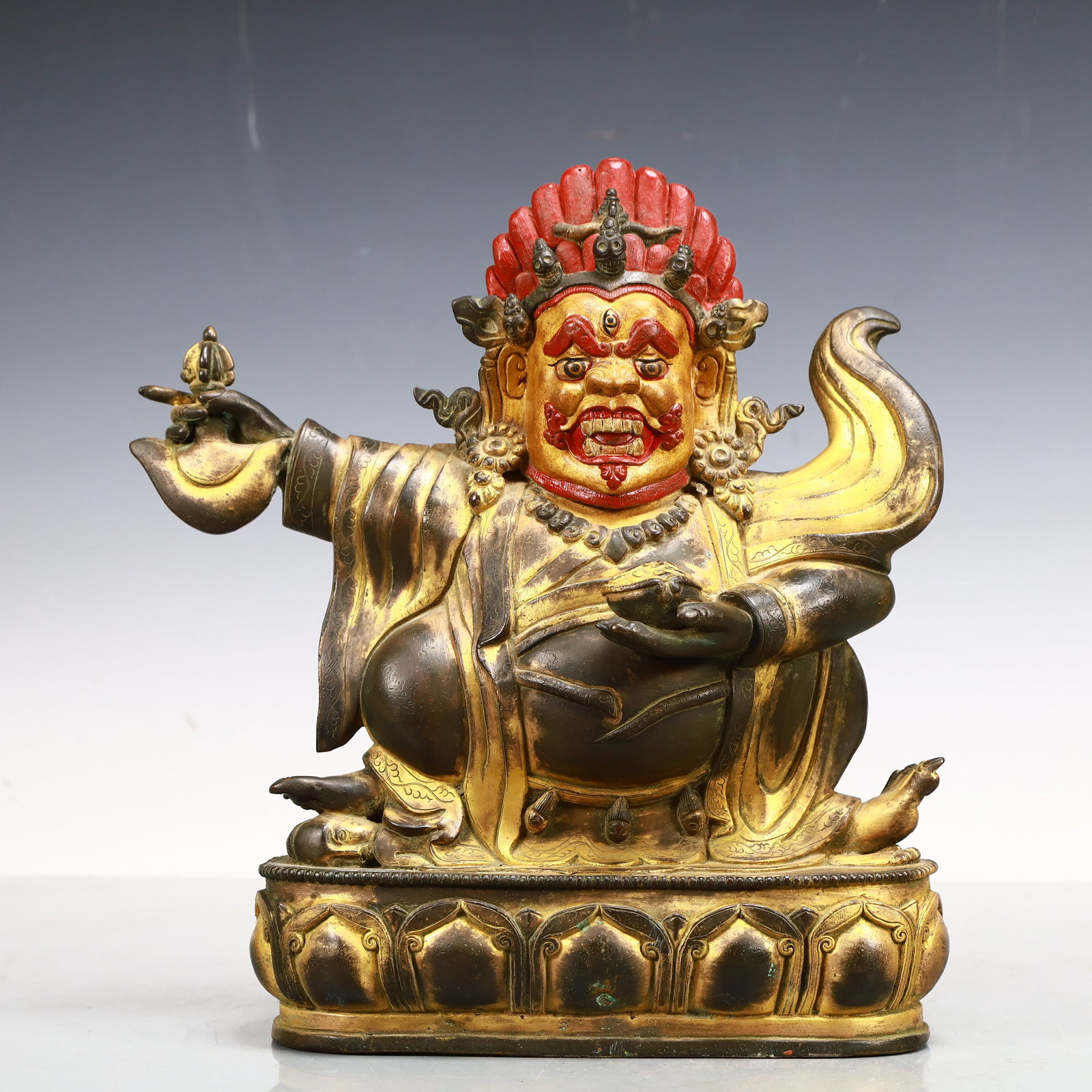 A Exquisite Gilt Bronze Statue of Mammon: A Exquisite Gilt Bronze Statue of Mammon Qing Dynasty, China Size:24cmx8cmx28cm Weight:4000g (The Dimensions Of All Batches Are Manually Measured.If You Need More Detailed Information, Please Contact