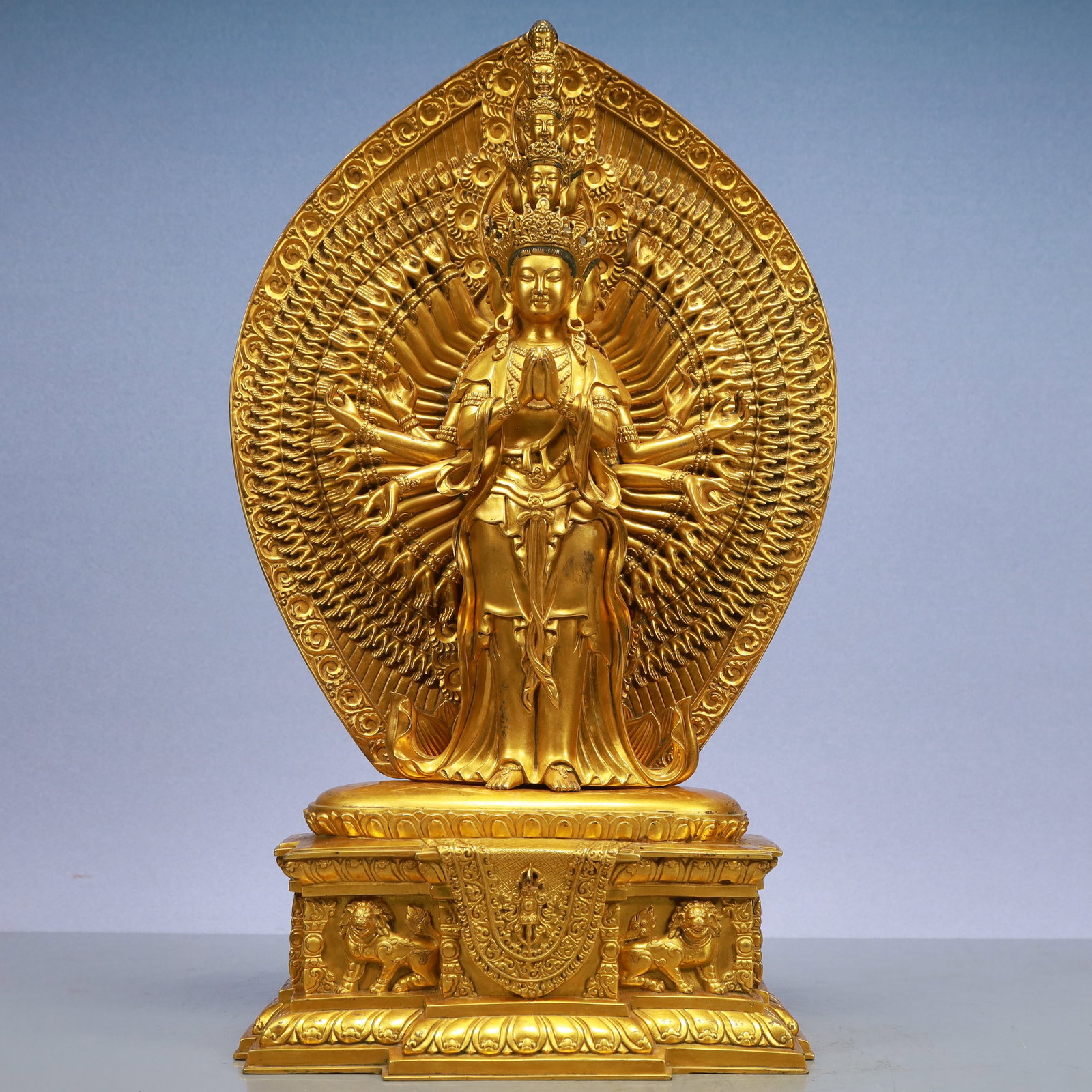 An Exquisite Gilt Bronze Statue of Thousand-hand Guanyin: An Exquisite Gilt Bronze Statue of Thousand-hand Guanyin Qing Dynasty, China Size:24cmx15cmx47cm Weight:14850g (The Dimensions Of All Batches Are Manually Measured.If You Need More Detailed
