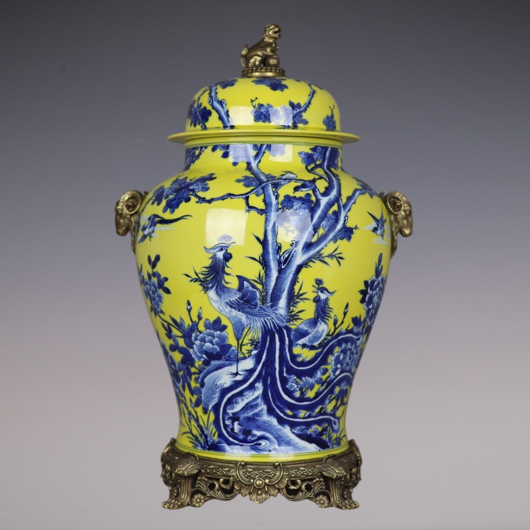 An Exquisite Blue and White Inlaid Bronze Flower and Bird Pattern Double-Ears Jar: An Exquisite Blue and White Inlaid Bronze Flower and Bird Pattern Double-Ears Jar Qing Dynasty, China Qianlong Six-character Mark Size:53cmx31cm (The Dimensions Of All Batches Are Manually Measured.If