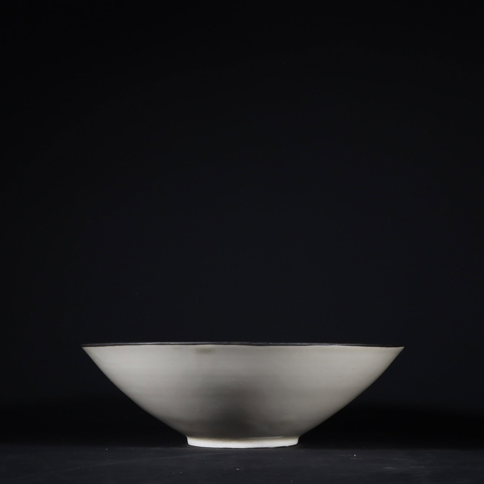 An Exquisite Ding yao Flower Pattern Bowl: An Exquisite Ding yao Flower Pattern Bowl Song Dynasty, China Size:6.6cmx21.8cm (The Dimensions Of All Batches Are Manually Measured.If You Need More Detailed Information, Please Contact Our Customer 