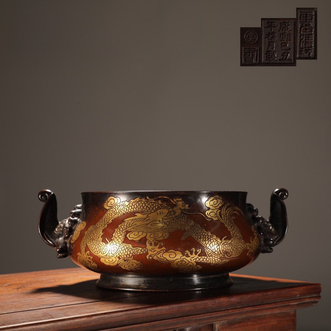 An Exquisite Gilt Bronze Dragon Pattern Double-Ears Censer: An Exquisite Gilt Bronze Dragon Pattern Double-Ears Censer Ming Dynasty, China Size:9.6cmx20cm Weight:3.8kg (The Dimensions Of All Batches Are Manually Measured.If You Need More Detailed Information, 