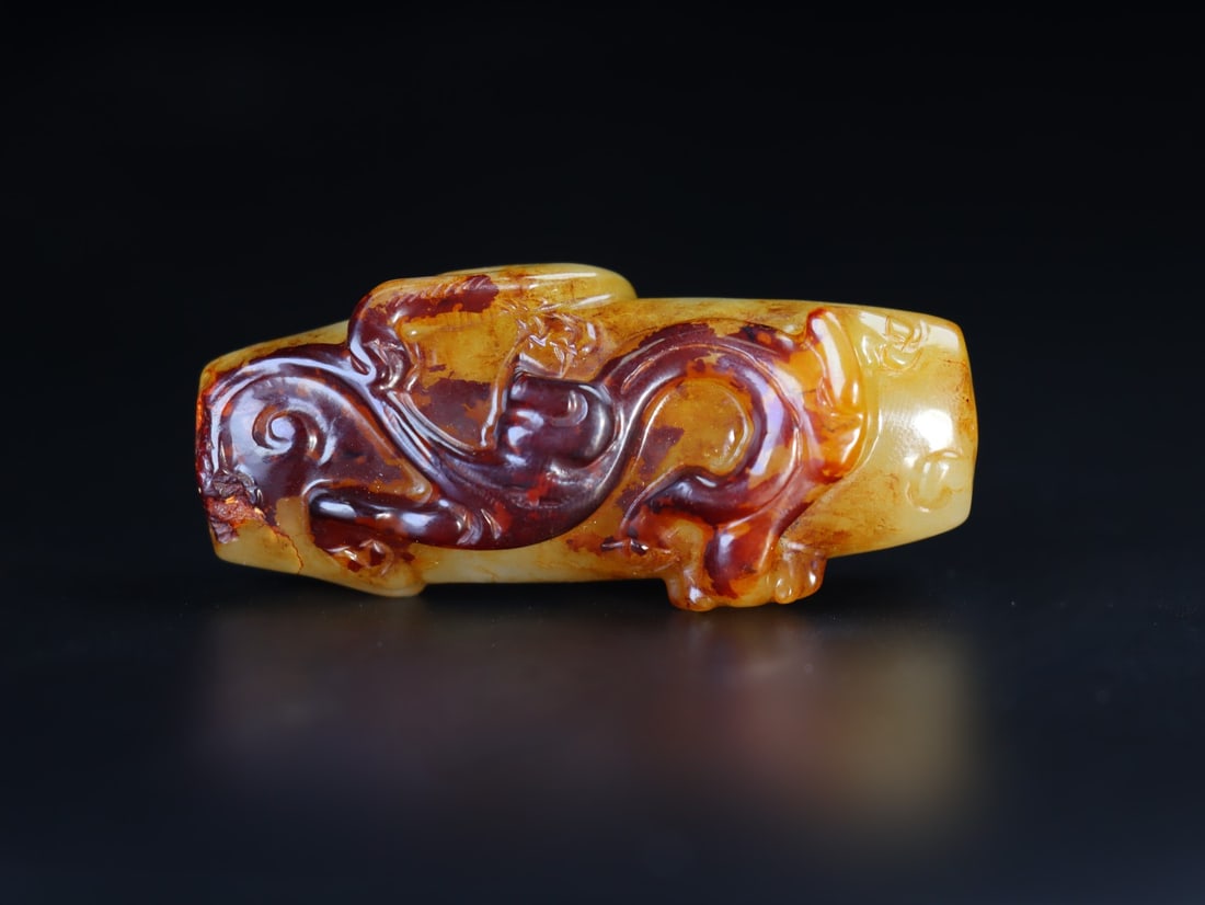 A Exquisite Hetian jade Beast-Face Pattern Ornament: A Exquisite Hetian jade Beast-Face Pattern Ornament Qing Dynasty, China Size:6.5cmx2.7cmx1.9cm Weight:61g (The Dimensions Of All Batches Are Manually Measured.If You Need More Detailed Information, Pl