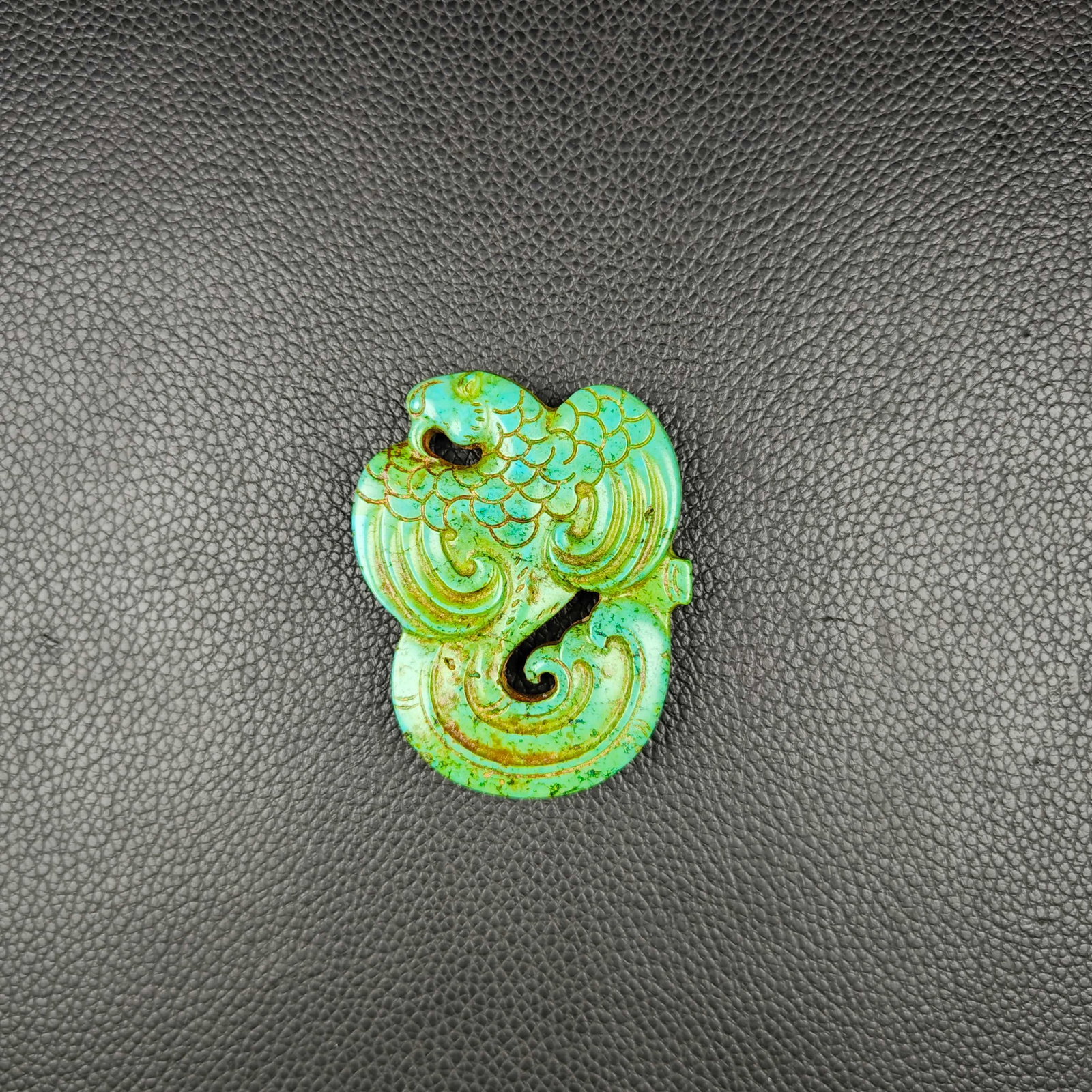 An Exquisite Turquoise Dragon Pendant: An Exquisite Turquoise Dragon Pendant the Warring States period in China Size:5.5cmx4.5cm Weight:33g (The Dimensions Of All Batches Are Manually Measured.If You Need More Detailed Information, Please 