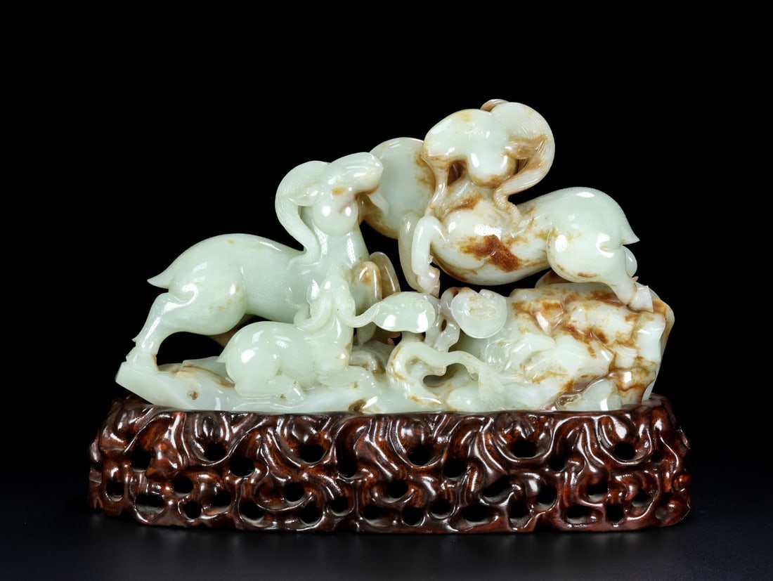 An Exquisite White Jade Sheep Ornament (1 of 9)