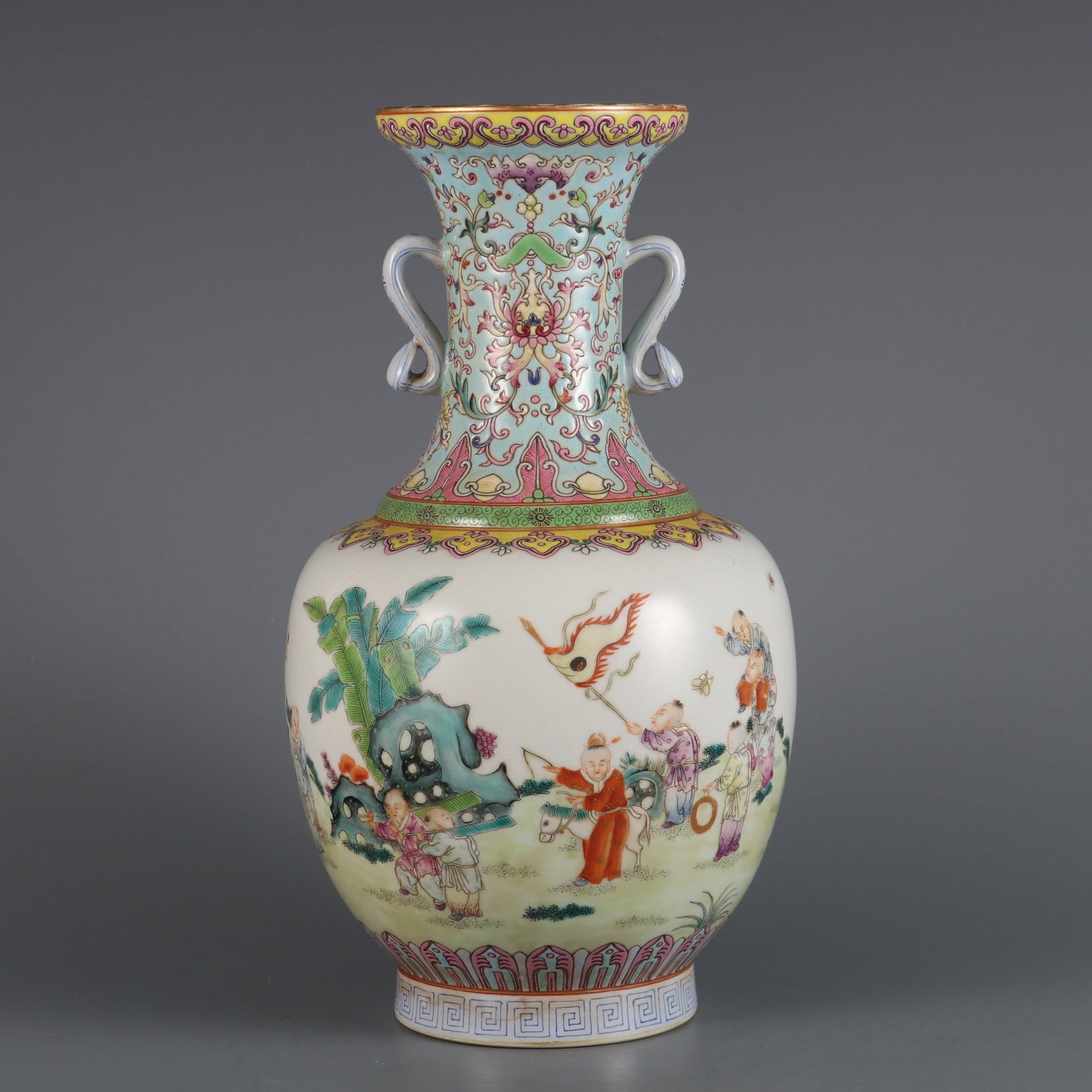 An Exquisite Famille-Rose Lotus Pattern Character and Story Pattern Double-Ears Vase: An Exquisite Famille-Rose Lotus Pattern Character and Story Pattern Double-Ears Vase Qing Dynasty, China Jiaqing Six-character Mark Size:28.8cmx15cm (The Dimensions Of All Batches Are Manually Measure