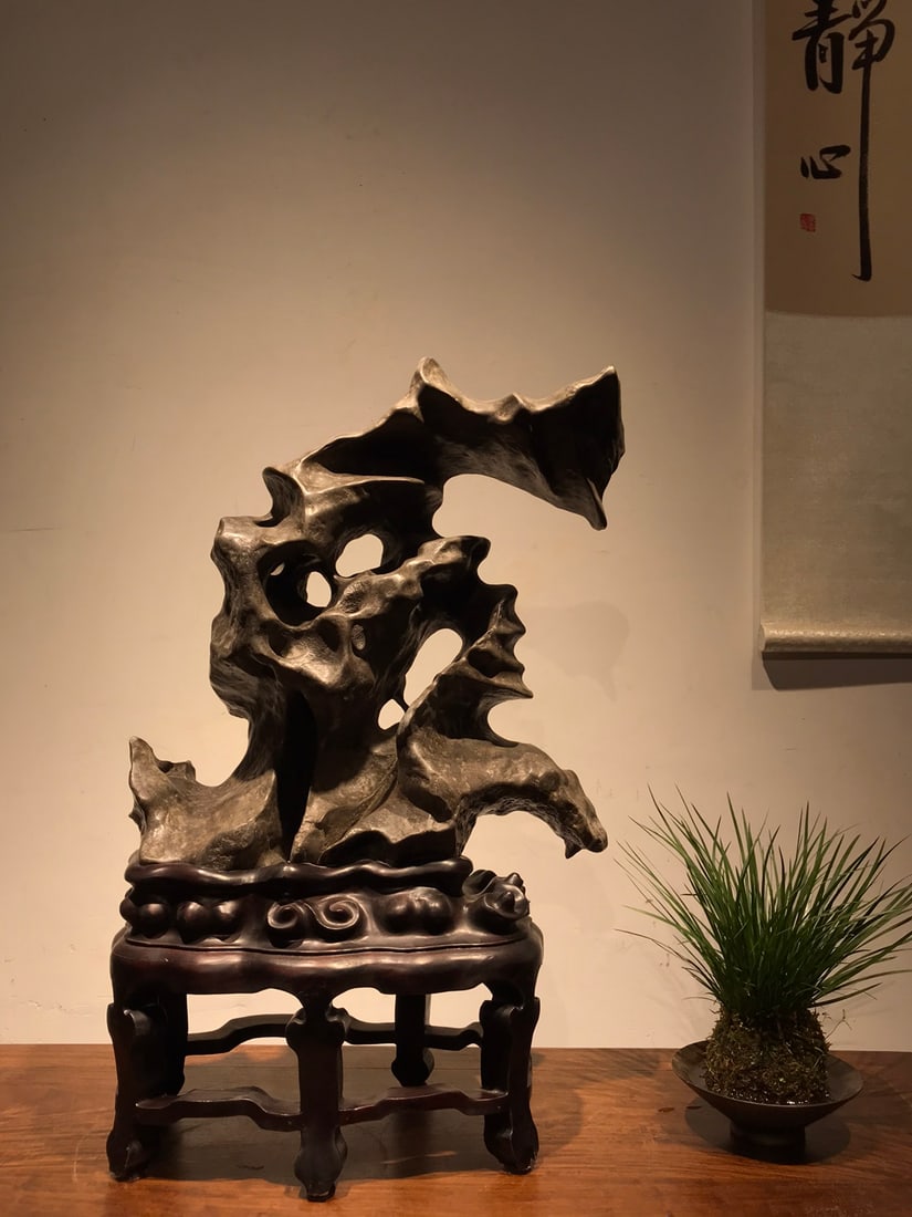 An Exquisite Taihu Stone Ornament: An Exquisite Taihu Stone Ornament Qing Dynasty, China Size:58cmx40cmx20cm (The Dimensions Of All Batches Are Manually Measured.If You Need More Detailed Information, Please Contact Our Customer Servic