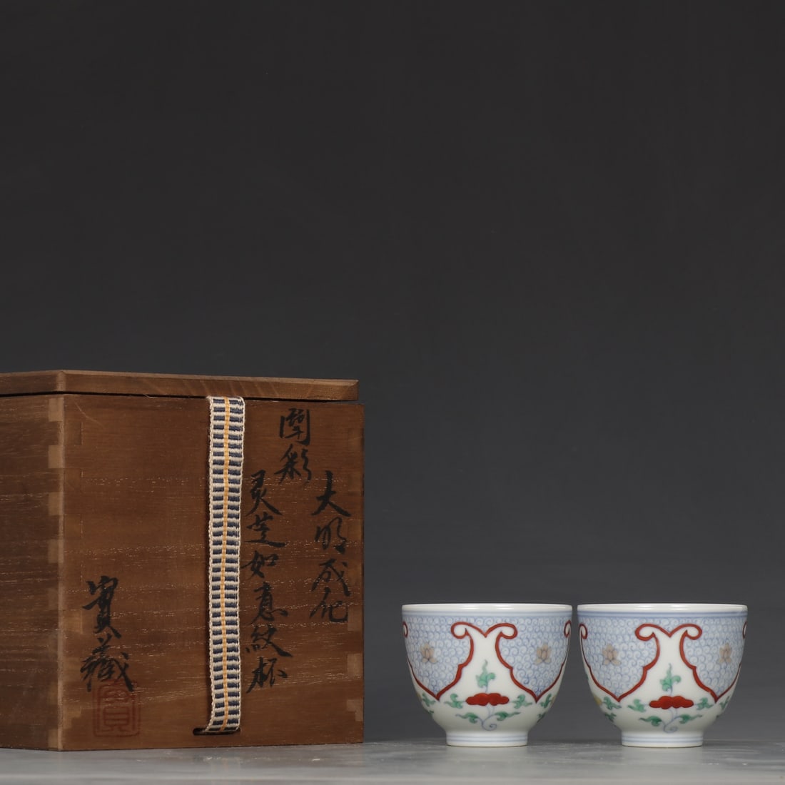 A Pair of Exquisite Doucai Ganoderma lucidum Pattern Cup: A Pair of Exquisite Doucai Ganoderma lucidum Pattern Cup Ming Dynasty, China Chenghua Six-character Mark Size:5.2cmx6.3cm (The Dimensions Of All Batches Are Manually Measured.If You Need More Detailed
