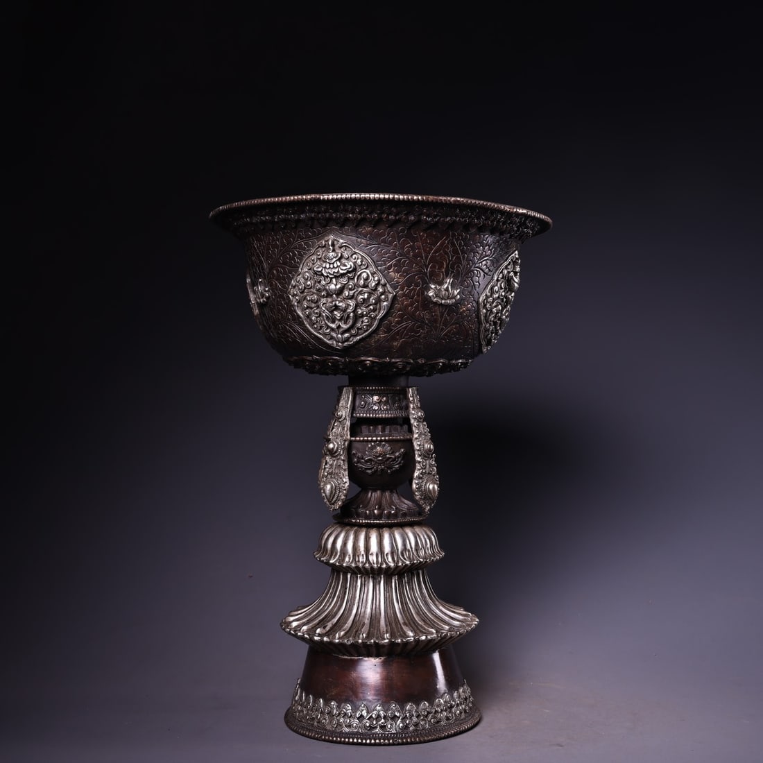An Exquisite Silver Bronze Eight Treasures Pattern Candlestick: An Exquisite Silver Bronze Eight Treasures Pattern Candlestick Han Dynasty, China Size:29cmx20cm Weight:2510g (The Dimensions Of All Batches Are Manually Measured.If You Need More Detailed Information