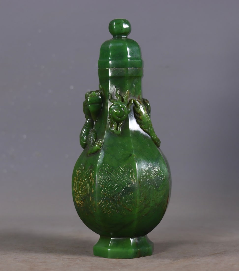 An Exquisite Jasper Dragon Pattern Eight Treasures Pattern Vase: An Exquisite Jasper Dragon Pattern Eight Treasures Pattern Vase Qing Dynasty, China Size: 19cmx7.5cm Weight:654g (The Dimensions Of All Batches Are Manually Measured.If You Need More Detailed