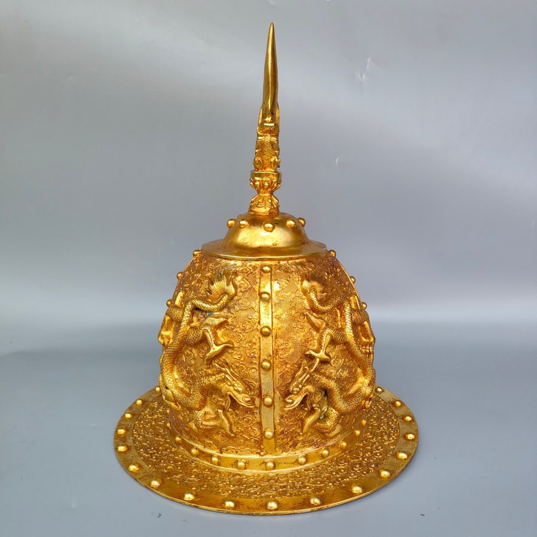 A beautiful Liao Dynasty bronze gilt general's hat: Liao Dynasty bronze gilt general's hat SIZE: W:28cm H:34cm W:3.6kg (The Dimensions Of All Batches Are Manually Measured.If You Need More Detailed Information, Please Contact Our Customer Service Befor