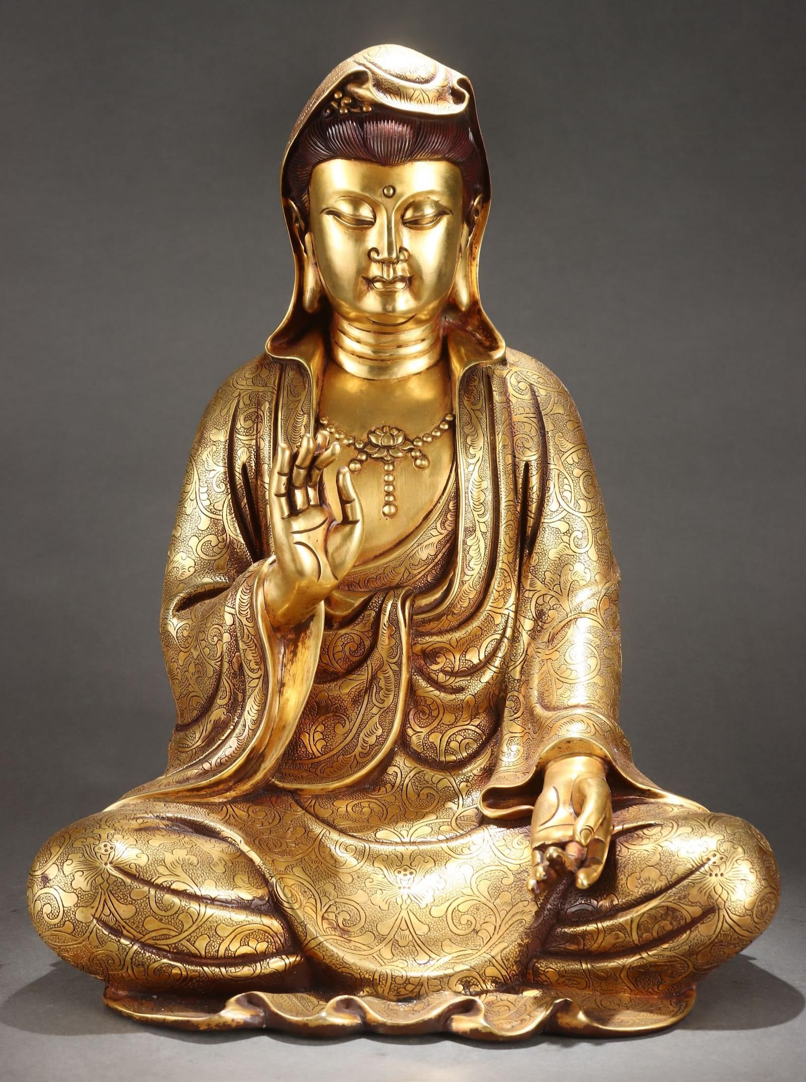 A fine gilded seated Guanyin statue from the Ming Dynasty: Ming Dynasty gilded seated statue of Zizai Guanyin SIZE: H:51cm W:36cm W:21.5kg (The Dimensions Of All Batches Are Manually Measured.If You Need More Detailed Information, Please Contact Our Customer 