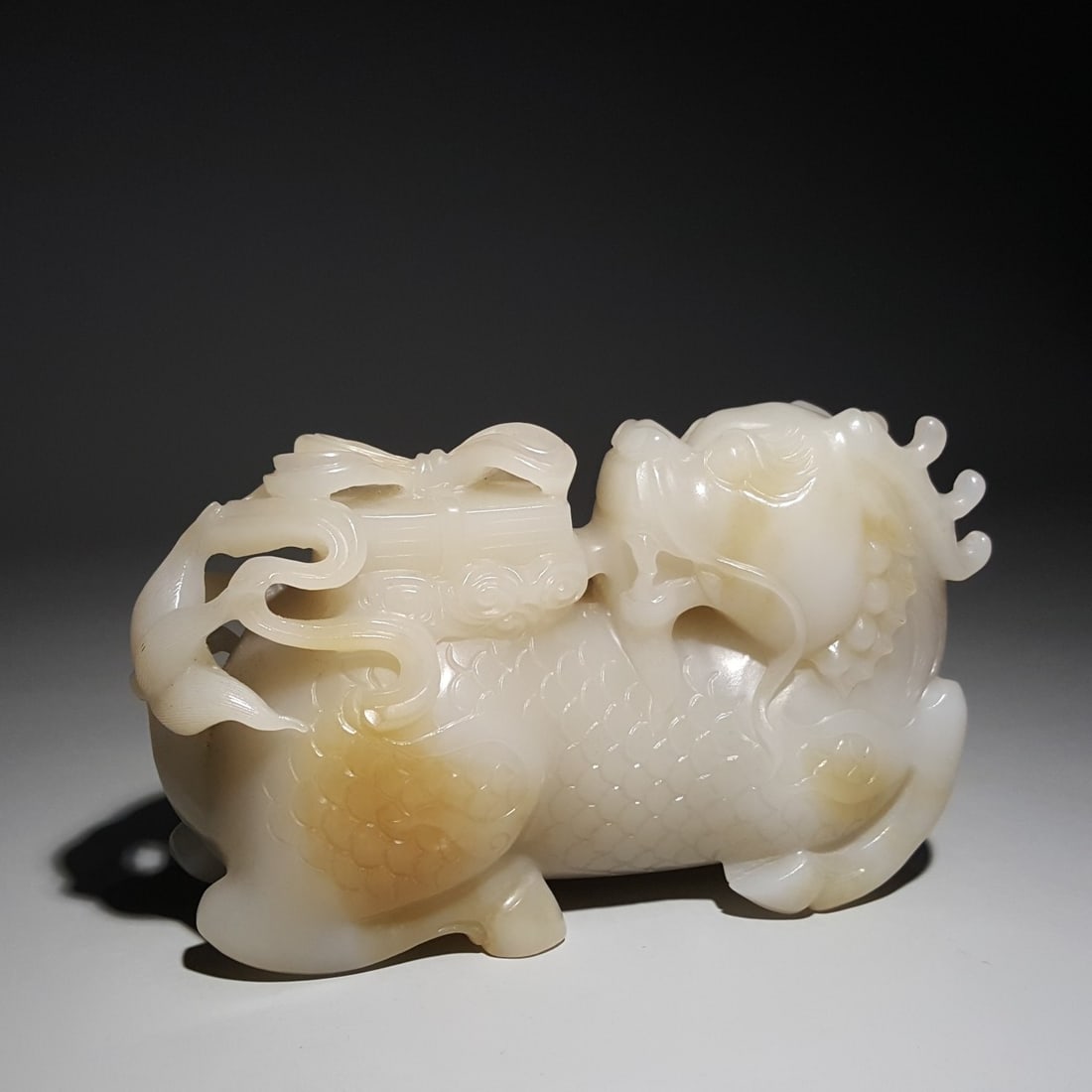 A beautiful Qing Dynasty Hetian jade qilin gifted a book (1 of 9)