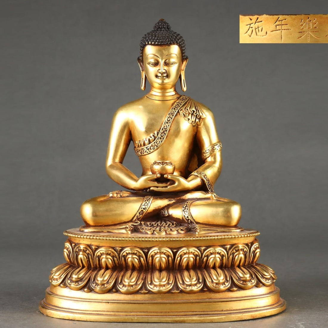 A fine Ming Dynasty gilt seated statue of Amitabha Buddha: Ming Dynasty Gilded Seated Amitabha Buddha SIZE: H:23.5cm W:18.7cm W:5.5kg (The Dimensions Of All Batches Are Manually Measured.If You Need More Detailed Information, Please Contact Our Customer Servi
