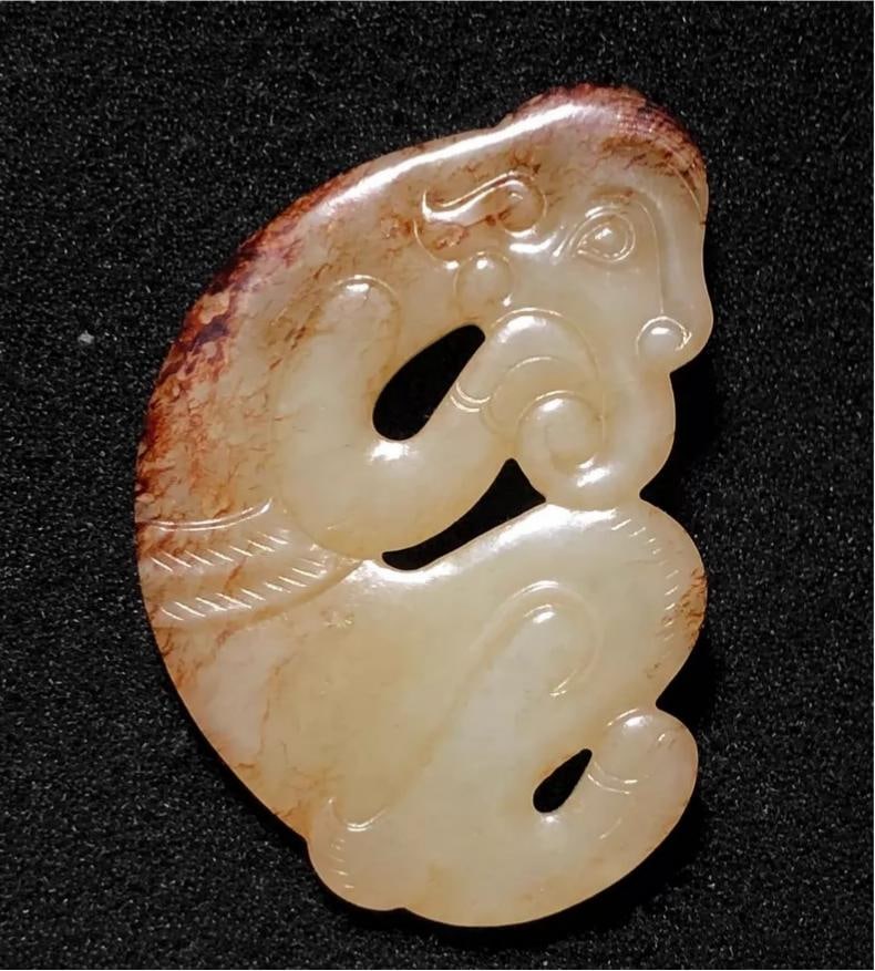 A fine Han Dynasty elephant-head human pendant: In the Han dynasty, it was an elephant-headed human body ornament SIZE: L:5.0cm W:3.4cm W:0.45cm W:15.0g (The Dimensions Of All Batches Are Manually Measured.If You Need More Detailed Information, Ple