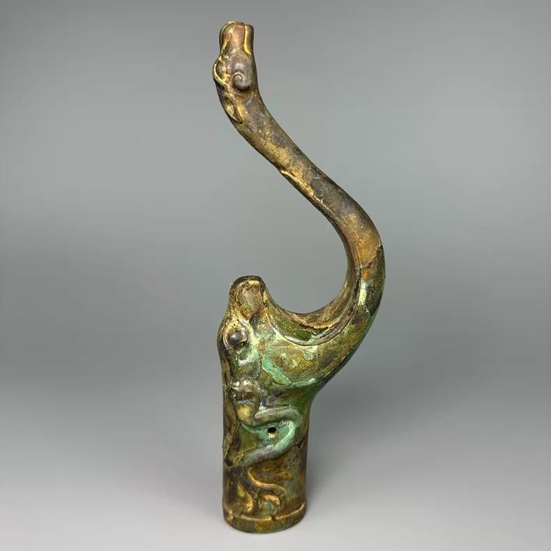 A fine Han dynasty bronze beast-head bow vessel: Han dynasty bronze beast-head bow vessel SIZE: L:7.3cm W:3.5cm H:22cm (The Dimensions Of All Batches Are Manually Measured.If You Need More Detailed Information, Please Contact Our Customer Service Be