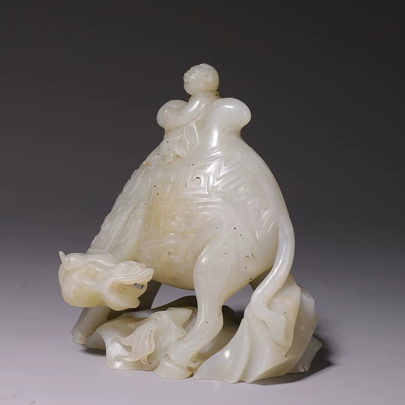 A fine Han Dynasty Hetian jade camel: Han Dynasty Hetian Yuyu Camel SIZE: L:18cm H:10cm W:125g (The Dimensions Of All Batches Are Manually Measured.If You Need More Detailed Information, Please Contact Our Customer Service Before Bidding.