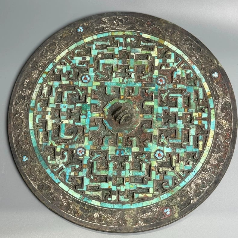 A fine Han Dynasty bronze mirror inlaid with turquoise (1 of 9)