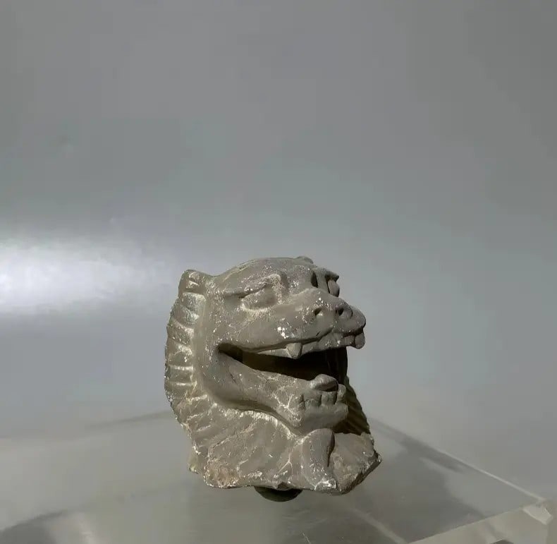 A fine fragment of a beast head made of Han dynasty bluestone: Han dynasty bluestone beast-head fragment SIZE: Approximately 7cm (The Dimensions Of All Batches Are Manually Measured.If You Need More Detailed Information, Please Contact Our Customer Service Before