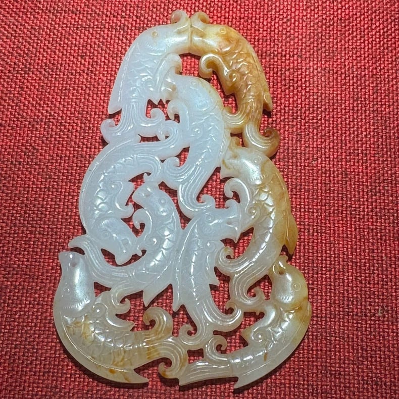 A fine Qing Dynasty Hetian white jade plaque with hollowed-out nine fish white jade plaques (1 of 9)