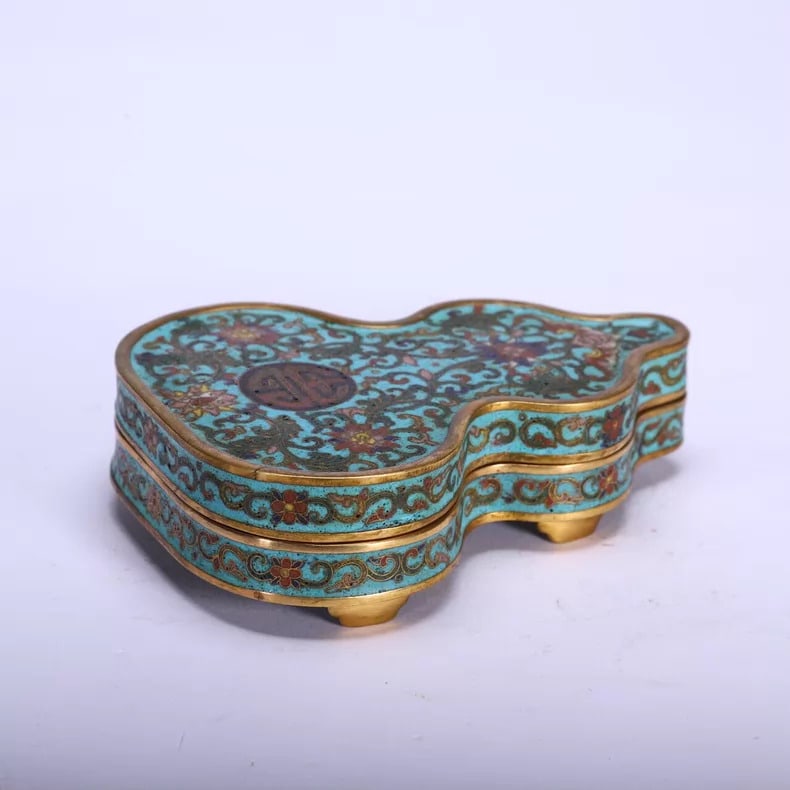 A fine Qing Dynasty copper gilt cloisode enamel gourd-shaped lidded box with entwined lotus lotus (1 of 9)