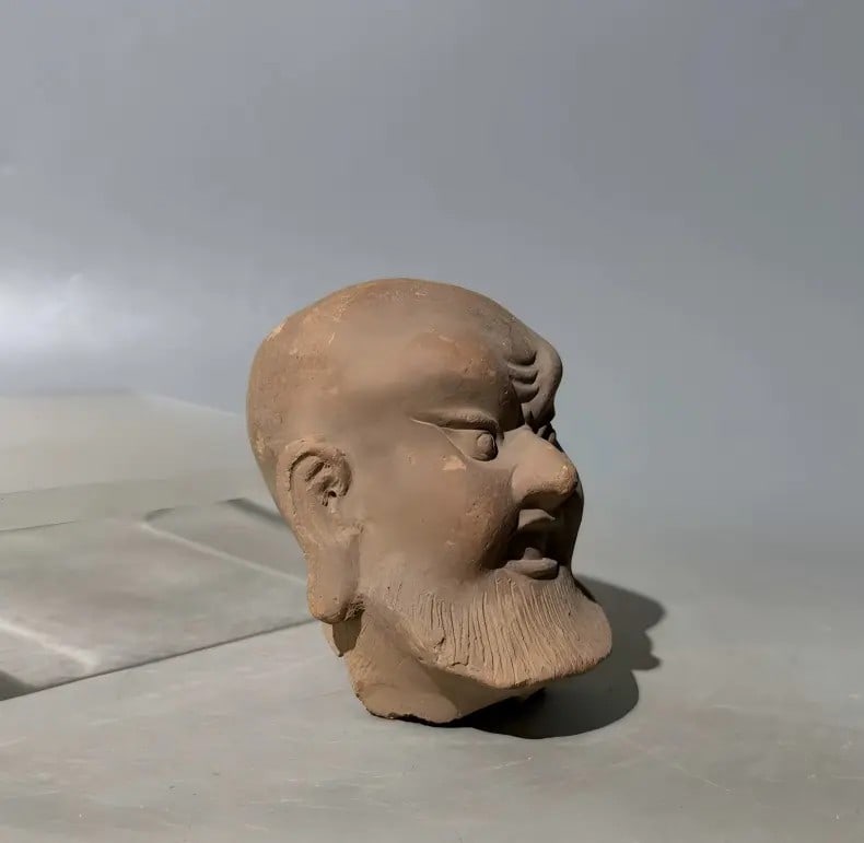 A beautiful Tang dynasty red pottery Arhat head: Tang dynasty red pottery Arhat head SIZE: H: approx. 11cm D: approx. 9cm (The Dimensions Of All Batches Are Manually Measured.If You Need More Detailed Information, Please Contact Our Customer