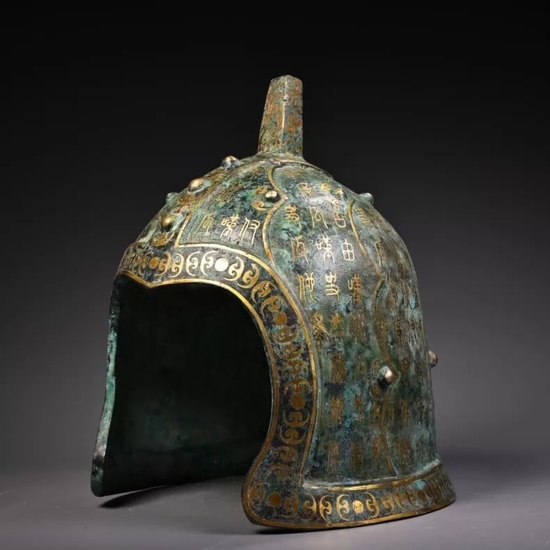 A fine Han Dynasty bronze helmet inlaid with gold: Han dynasty bronze helmet inlaid with gold SIZE: W:2000g H:30cm W:23cm (The Dimensions Of All Batches Are Manually Measured.If You Need More Detailed Information, Please Contact Our Customer Service B