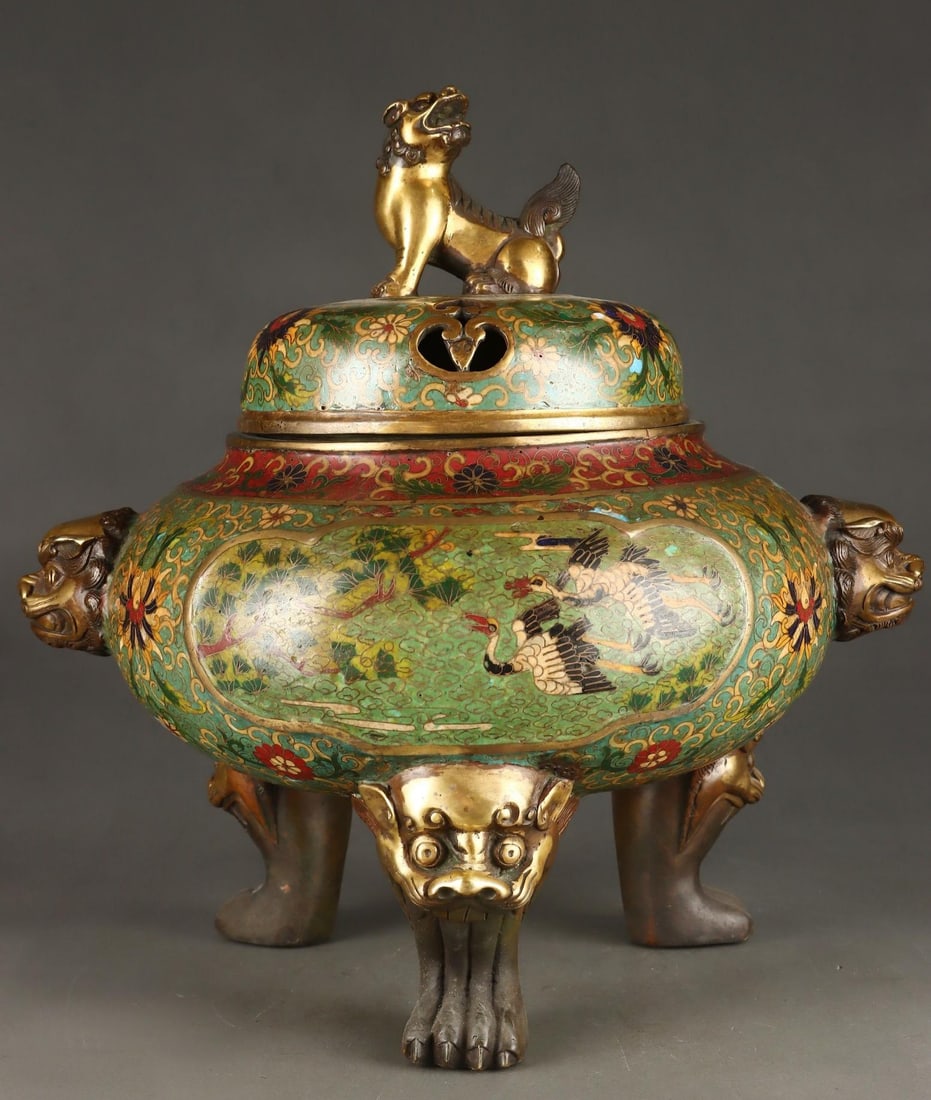 A fine Qing dynasty red copper cloisonne pine crane lion-head ear incense burner with longevity: Qing Dynasty reddish copper cloisonne pine crane longevity lion-head ear incense burner SIZE: H:39cm D:31cm Ear pitch 40cm W:15.3kg (The Dimensions Of All Batches Are Manually Measured.If You Need Mor