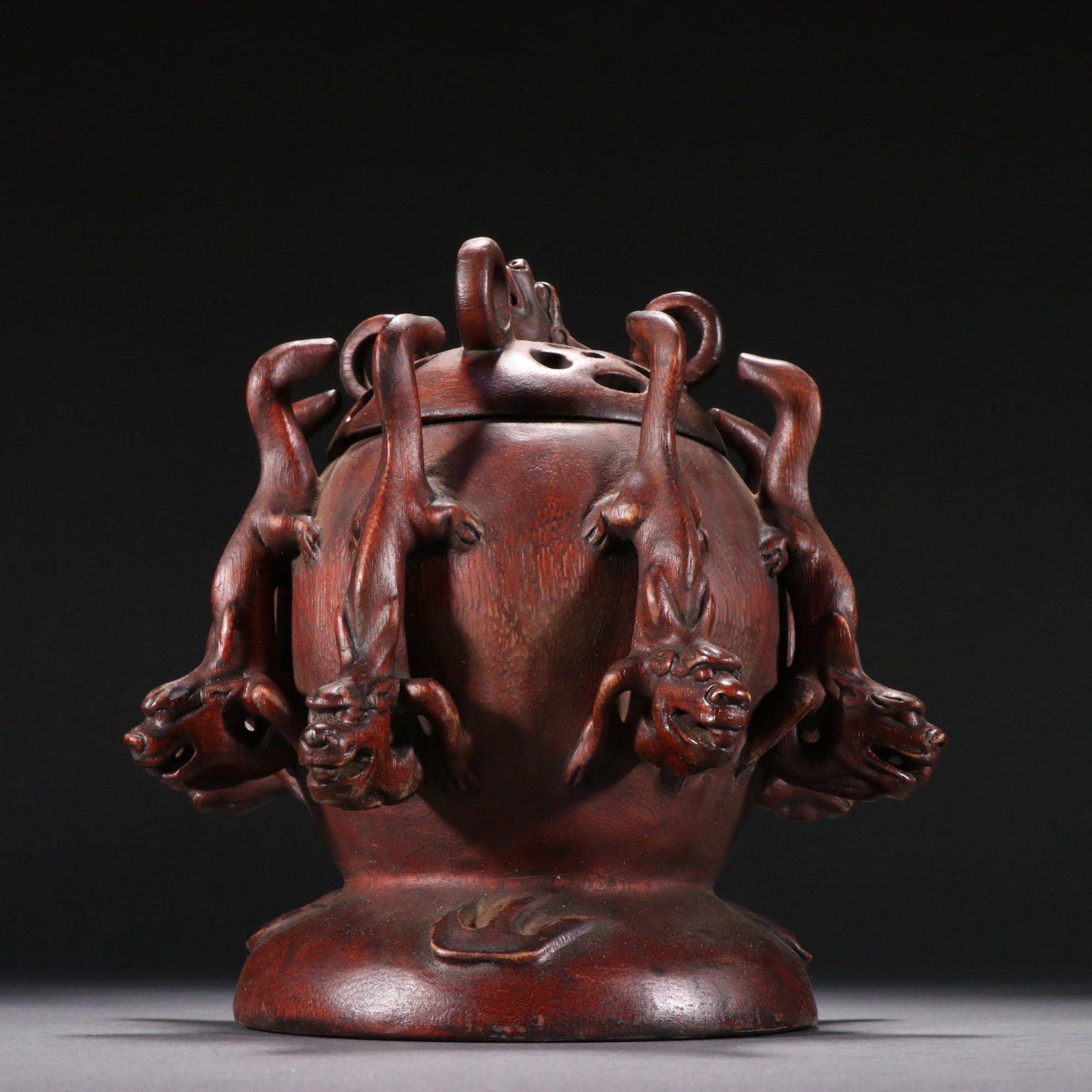 A fine Qing Dynasty agarwood nine-dragon pattern incense burner: Qing Dynasty agarwood nine-dragon pattern incense burner SIZE: H:17cmW:15.5cmW:264g (The Dimensions Of All Batches Are Manually Measured.If You Need More Detailed Information, Please Contact Our Custo