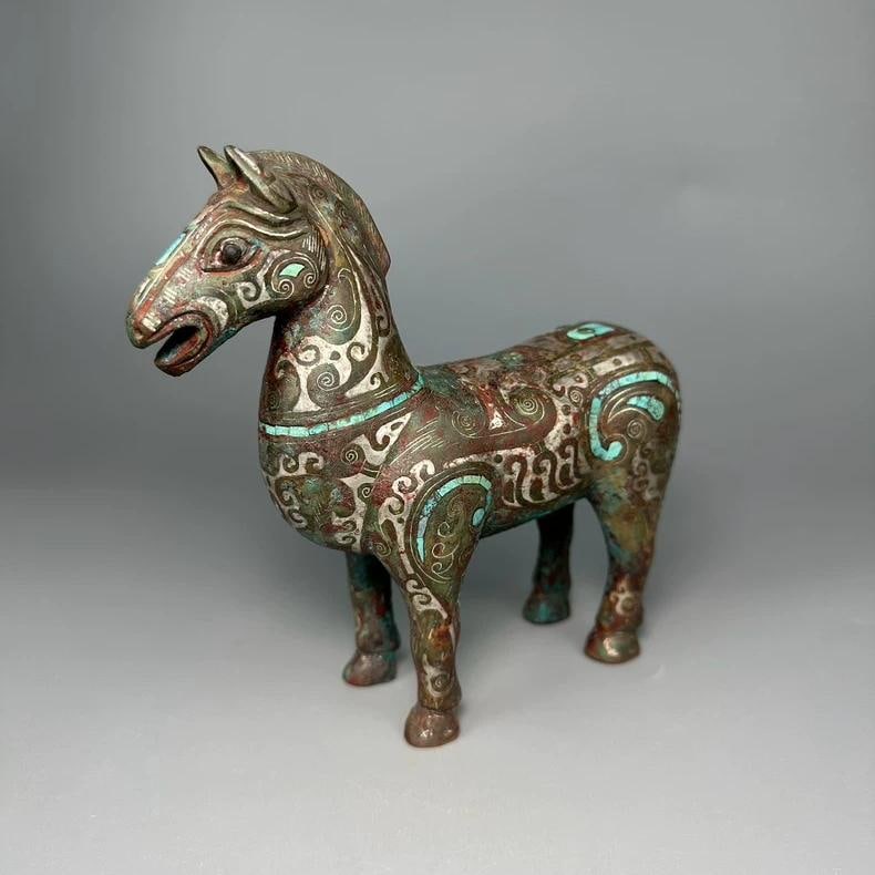 A fine Han dynasty bronze stone horse inlaid with gold and silver inlaid with pines: Han dynasty bronze stone horse inlaid with gold and silver inlaid with pines SIZE: L:15.5cm W:5cm H:14.6cm (The Dimensions Of All Batches Are Manually Measured.If You Need More Detailed Information, P