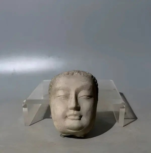 A fine fragment of a Han dynasty white marble Buddha face: Fragment of a Han dynasty white marble Buddha face SIZE: H: approximately 9.5cm (The Dimensions Of All Batches Are Manually Measured.If You Need More Detailed Information, Please Contact Our Customer