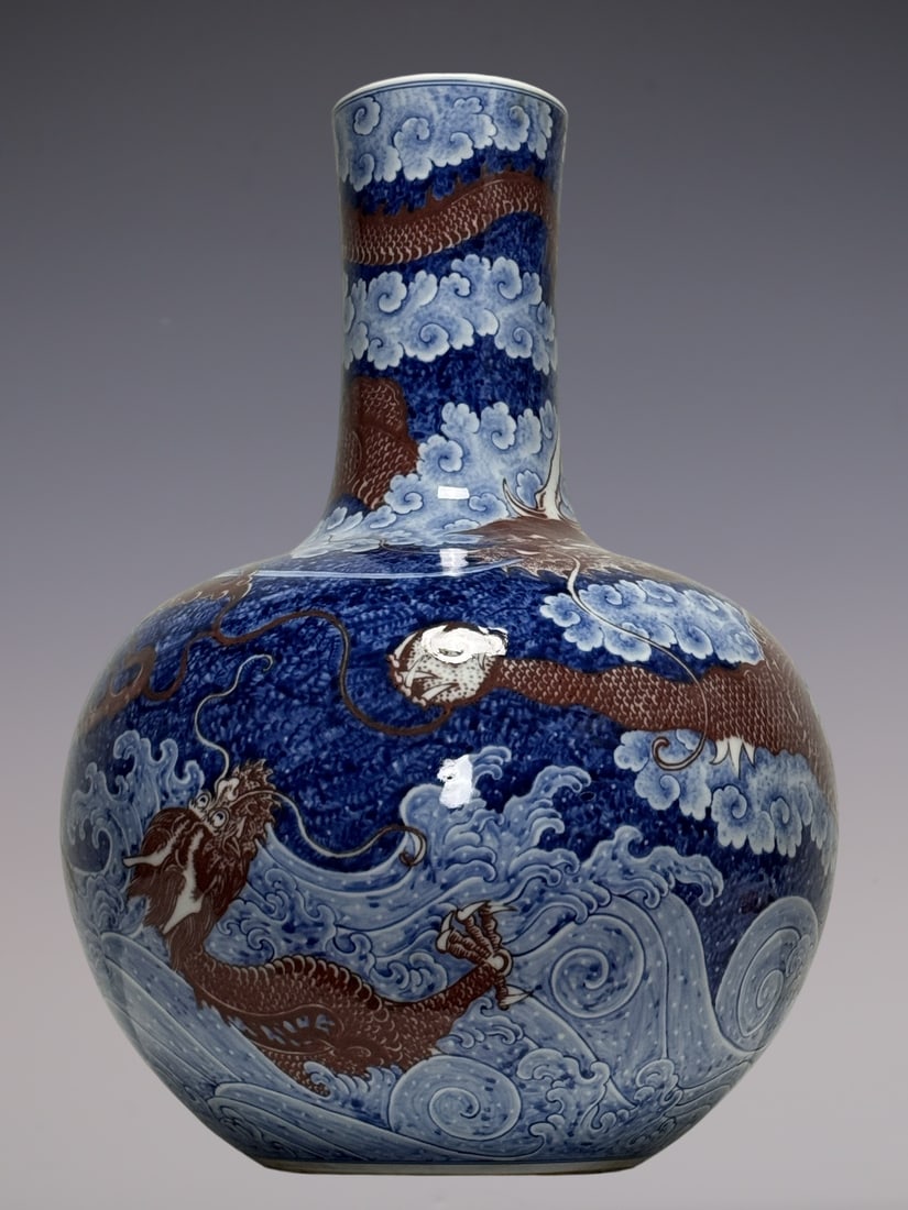 An Exquisite Blue and White Underglaze-Red Dragon Pattern Seawater Pattern Vase: An Exquisite Blue and White Underglaze-Red Dragon Pattern Seawater Pattern Vase Qing Dynasty, China Qianlong Six-character Mark Size:55cmx39cm (The Dimensions Of All Batches Are Manually Measured.If