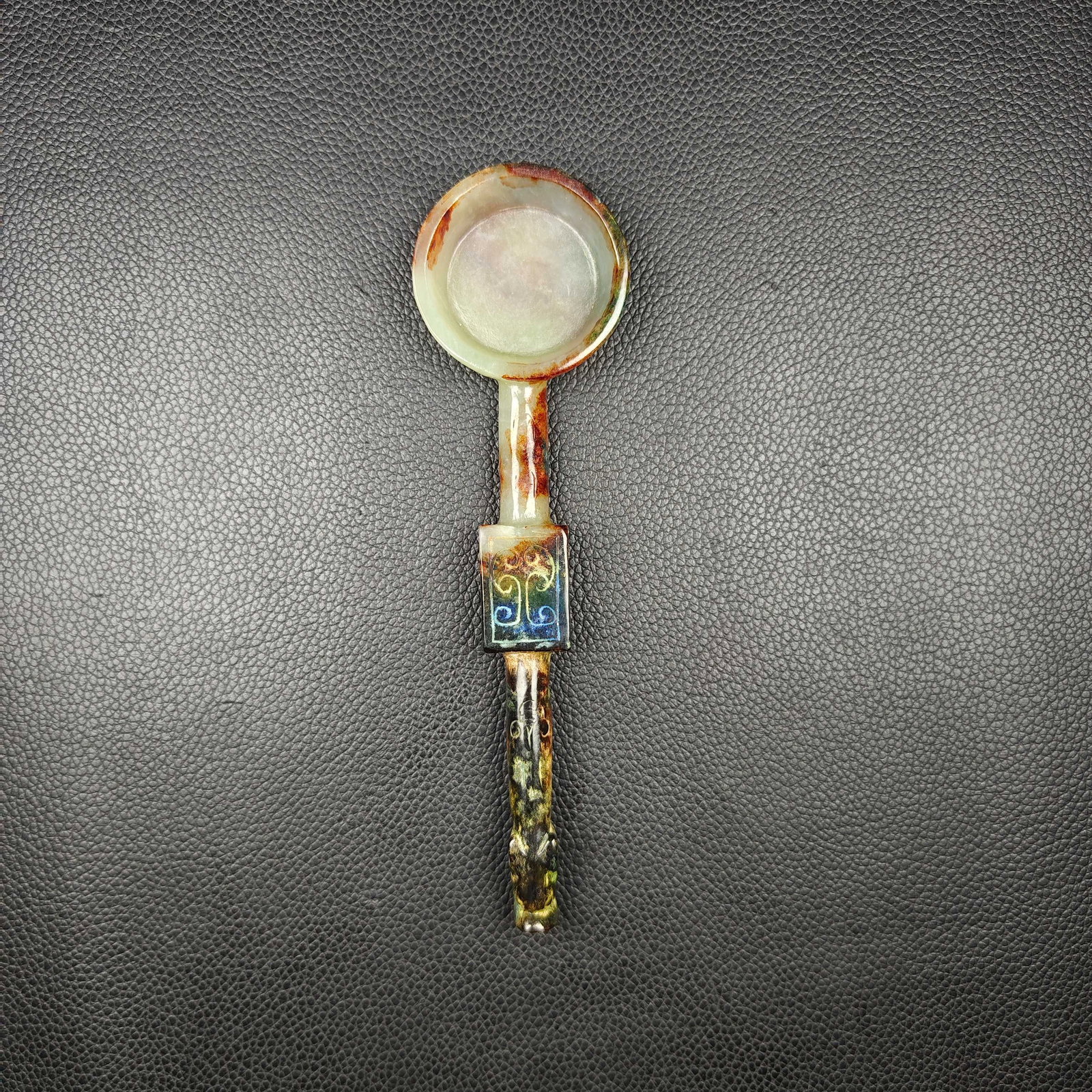 An Exquisite White Jade Spoon: An Exquisite White Jade Spoon Han Dynasty, China Size:4.5cmx15cm Weight:47g (The Dimensions Of All Batches Are Manually Measured.If You Need More Detailed Information, Please Contact Our Customer Serv