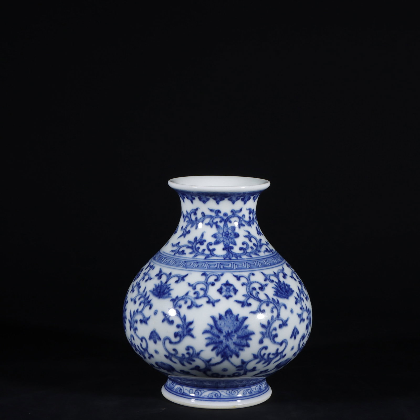 An Exquisite Blue and White Lotus Pattern Vase: An Exquisite Blue and White Lotus Pattern Vase Qing Dynasty, China Qianlong Six-character Mark Size:12cmx11cm (The Dimensions Of All Batches Are Manually Measured.If You Need More Detailed