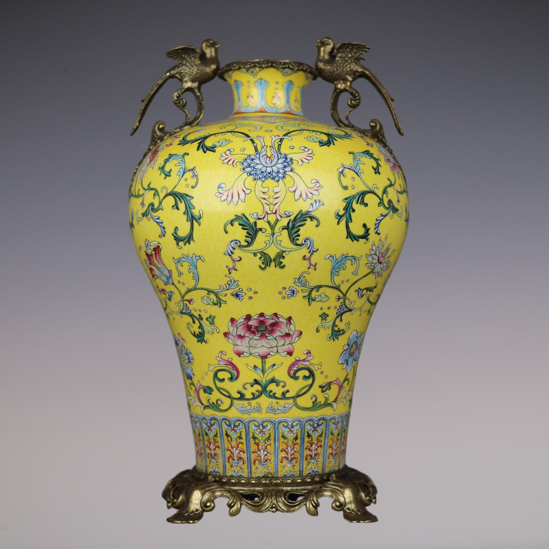 An Exquisite Enamel Inlaid Bronze Lotus Pattern Double-Ears Vase: An Exquisite Enamel Inlaid Bronze Lotus Pattern Double-Ears Vase Qing Dynasty, China Qianlong Four-character Mark Size:48cmx24cm (The Dimensions Of All Batches Are Manually Measured.If You Need More