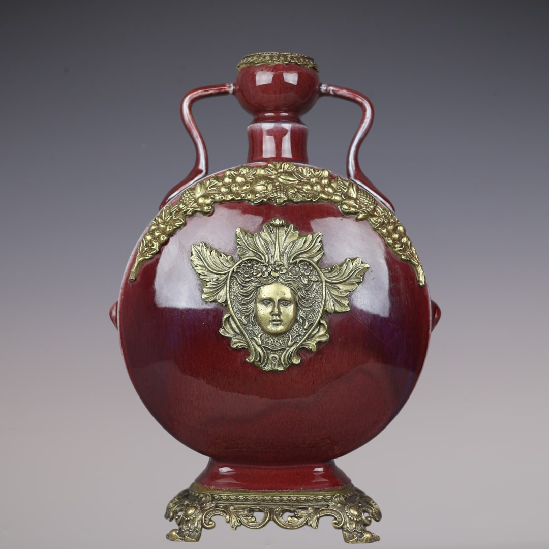 An Exquisite Iron-Red Inlaid Bronze Double-Ears Vase: An Exquisite Iron-Red Inlaid Bronze Double-Ears Vase Qing Dynasty, China Yongzheng Six-character Mark Size:40cmx27cm (The Dimensions Of All Batches Are Manually Measured.If You Need More Detailed