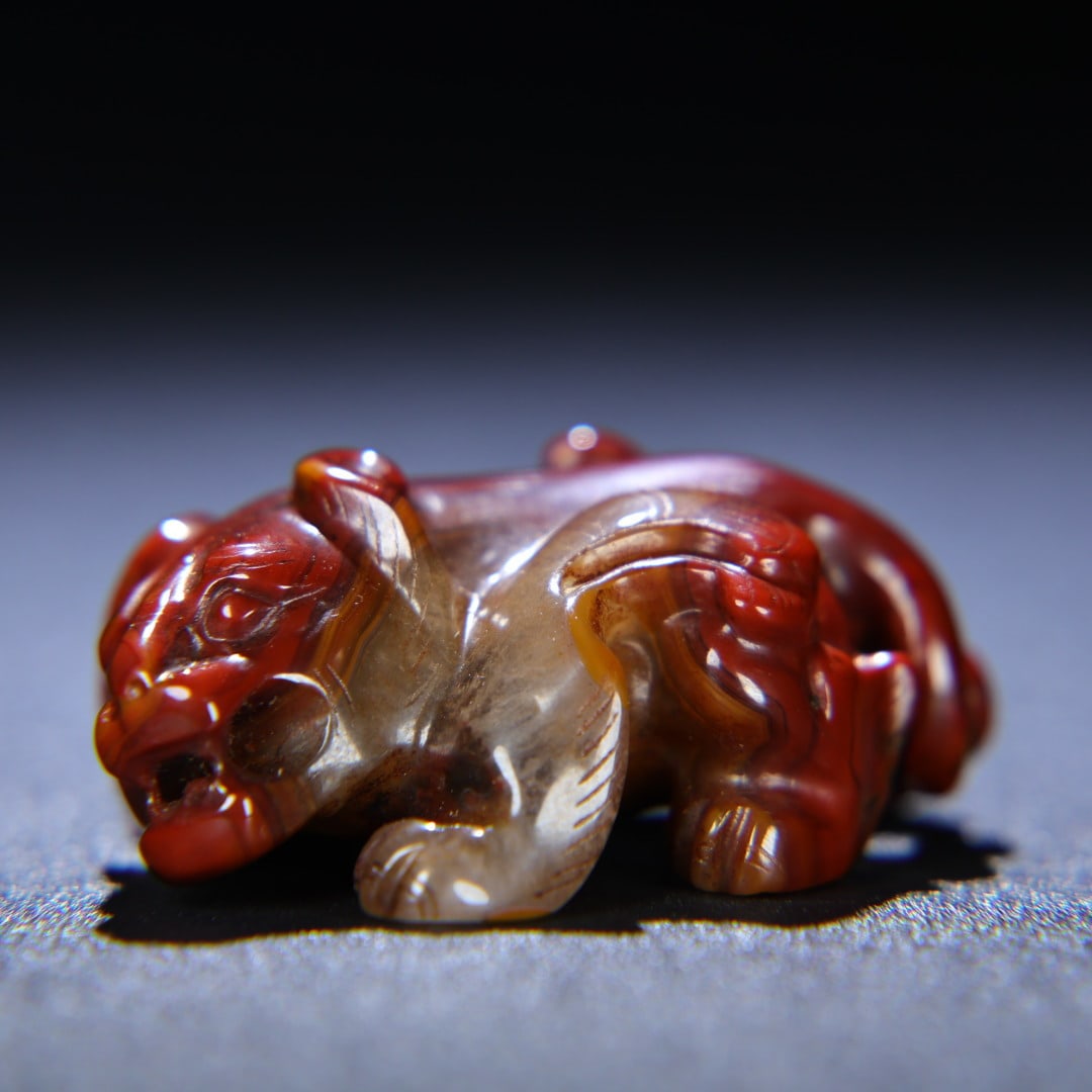 An Exquisite Red Jade Auspicious Beast Ornament: An Exquisite Red Jade Auspicious Beast Ornament the Warring States period in China Size:5.1cmx3.5cmx2cm Weight:41g (The Dimensions Of All Batches Are Manually Measured.If You Need More Detailed