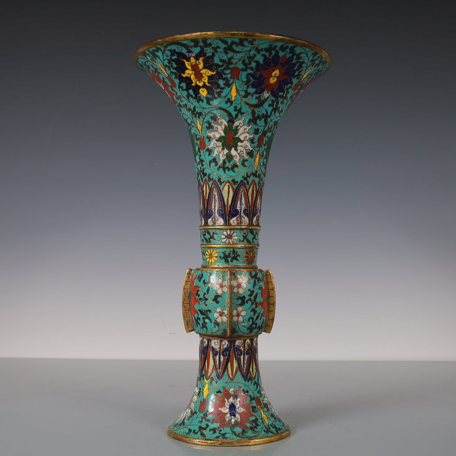 An Exquisite Cloisonne Gilt Bronze Lotus Pattern Flower Pattern Double-Ears Vase: An Exquisite Cloisonne Gilt Bronze Lotus Pattern Flower Pattern Double-Ears Vase Ming Dynasty, China Jingtai Four-character Mark Size:18.5cmx18.5cmx34.5cm Weight:1900g (The Dimensions Of All Batches A