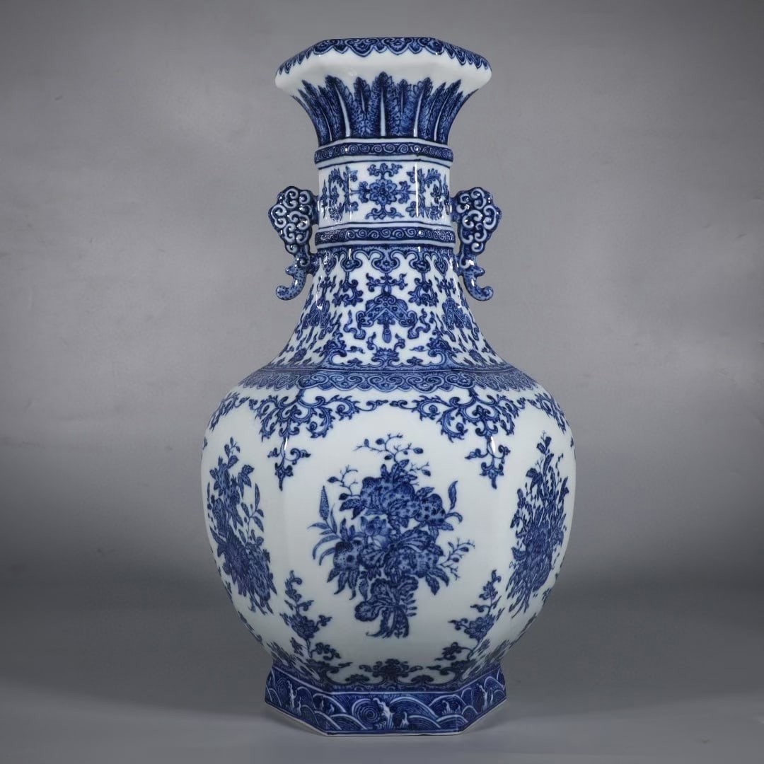 An Exquisite Blue and White Flower and Fruit Pattern Seawater Pattern Double-Ears Vase: An Exquisite Blue and White Flower and Fruit Pattern Seawater Pattern Double-Ears Vase Qing Dynasty, China Qianlong Six-character Mark Size:41cmx23cm (The Dimensions Of All Batches Are Manually
