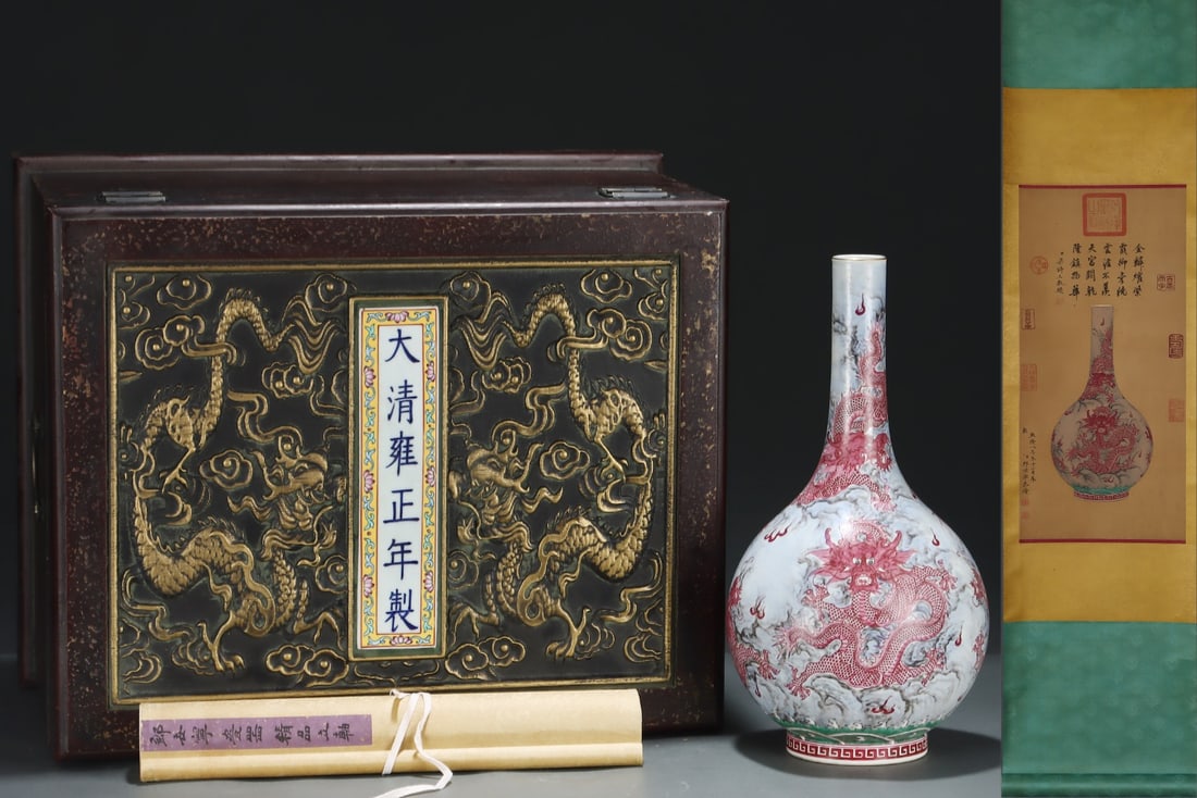 An Exquisite Famille-Rose Ruby Red-Glazed Painted Gold Dragon Pattern Seawater Pattern Vase: An Exquisite Famille-Rose Ruby Red-Glazed Painted Gold Dragon Pattern Seawater Pattern Vase Qing Dynasty, China Yongzheng Six-character Mark Without frame Size:62cmx30cm Size:37cmx18.5cm (The Dimensio
