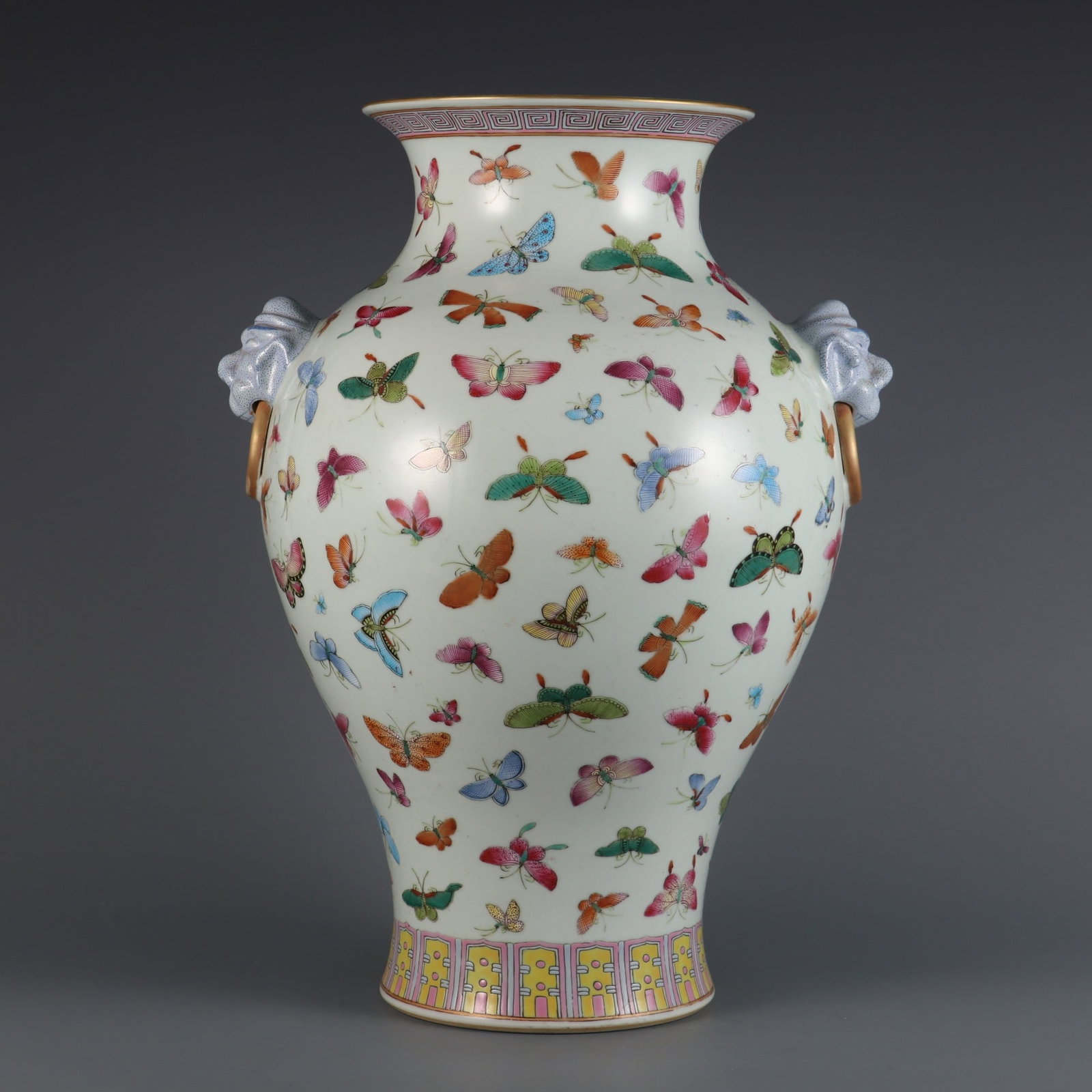 An Exquisite Famille-Rose Butterfly Pattern Double-Ears Vase: An Exquisite Famille-Rose Butterfly Pattern Double-Ears Vase Qing Dynasty, China Qianlong Six-character Mark Size:40.2cmx24cm (The Dimensions Of All Batches Are Manually Measured.If You Need More