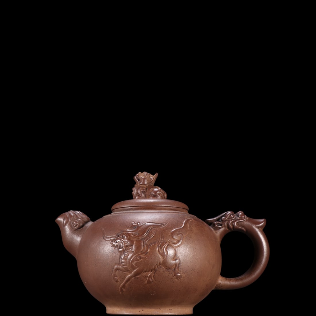An Exquisite Purple Sands Kylin Pattern Teapot: An Exquisite Purple Sands Kylin Pattern Teapot Xu han tang Size:12cmx15.4cm (The Dimensions Of All Batches Are Manually Measured.If You Need More Detailed Information, Please Contact Our Customer Serv