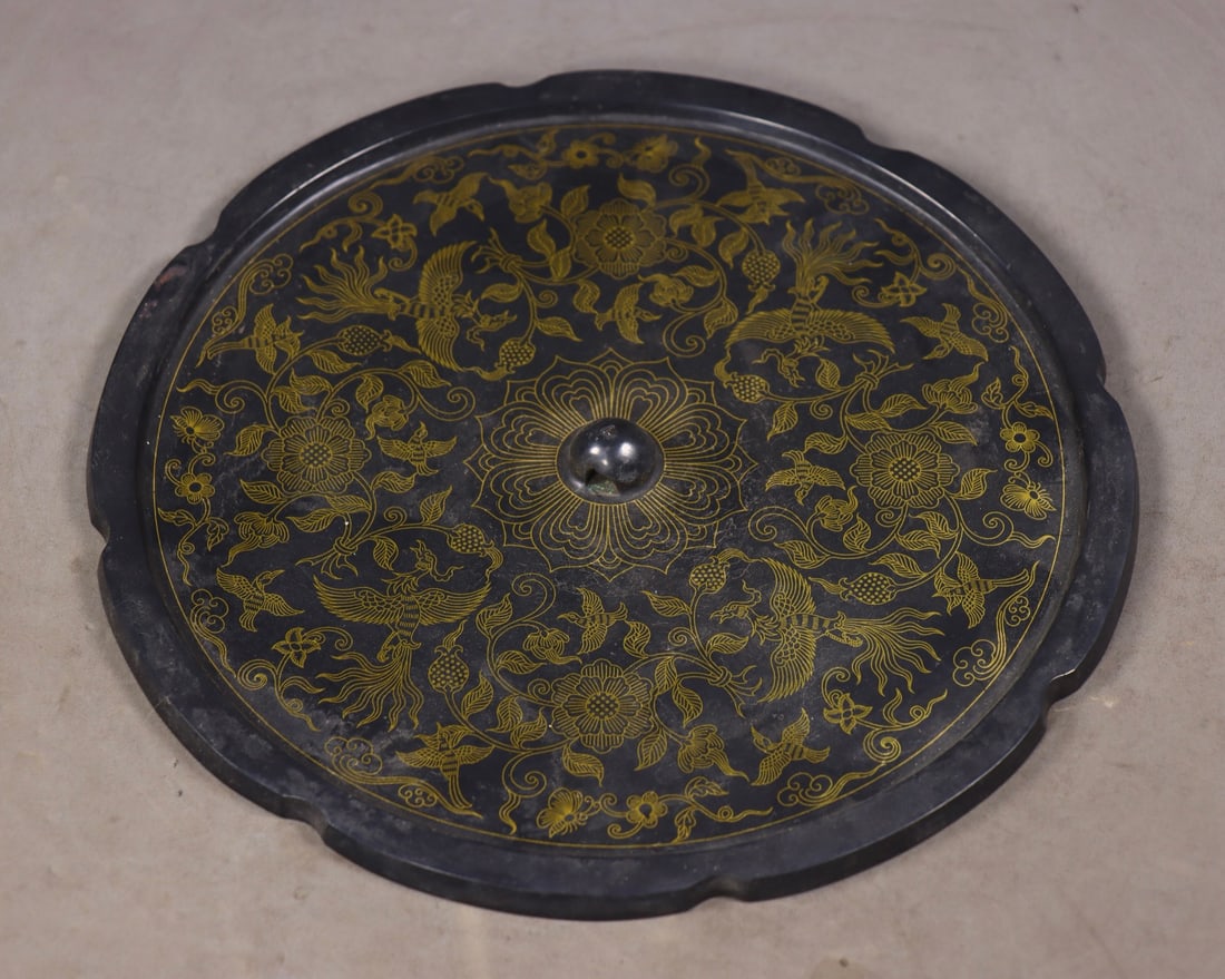An Exquisite Bronze Inlaid Gold and Silver Flower and Bird Pattern Round Mirror: An Exquisite Bronze Inlaid Gold and Silver Flower and Bird Pattern Round Mirror Han Dynasty, China Size: 2cmx22cm Weight:1170g (The Dimensions Of All Batches Are Manually Measured.If You Need More Det
