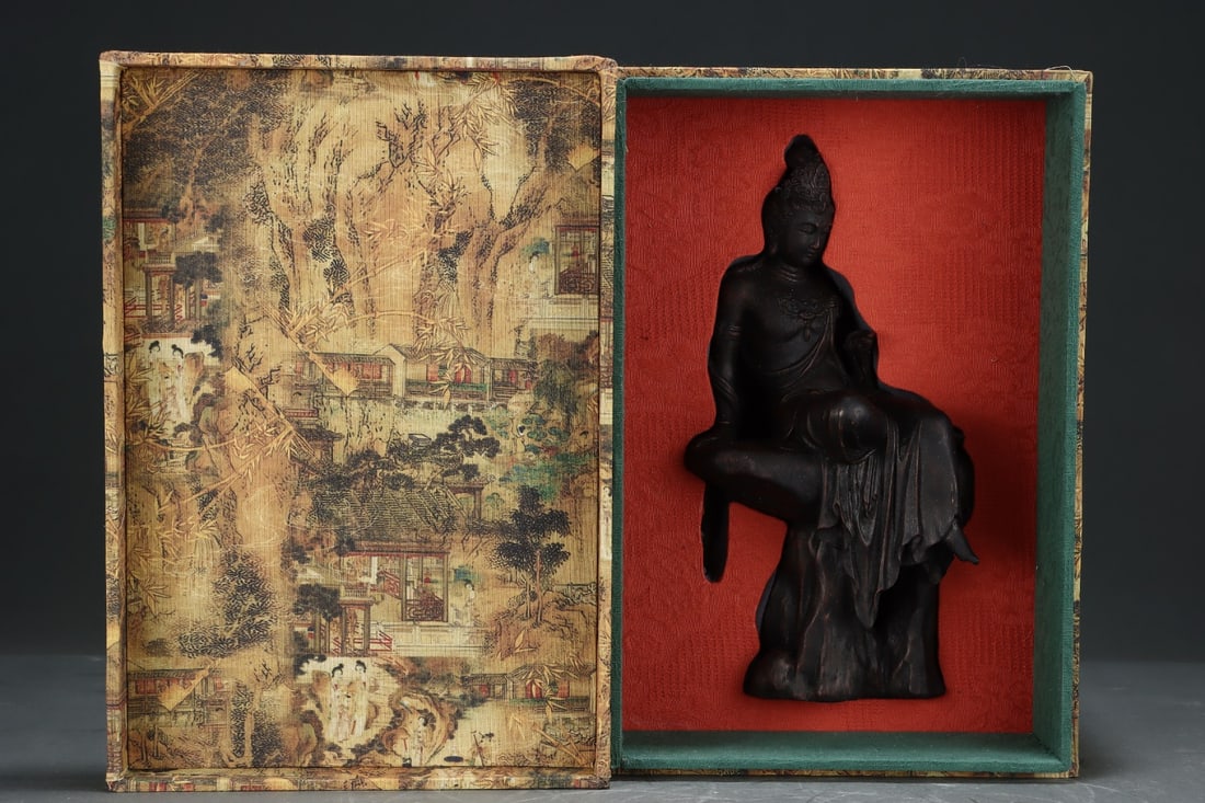 An Exquisite Eaglewood Statue of Avalokitesvara: An Exquisite Eaglewood Statue of Avalokitesvara Qing Dynasty, China Size:15cmx11.5cmx29.5cm (The Dimensions Of All Batches Are Manually Measured.If You Need More Detailed Information, Please Contact