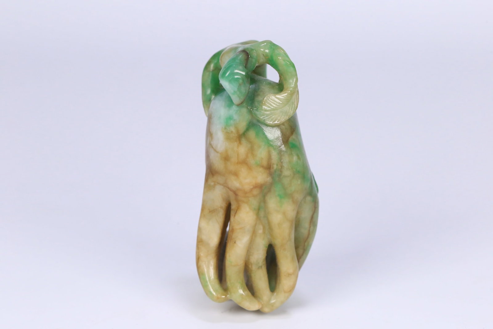An Exquisite Jadeite Bergamot Hand Piece: An Exquisite Jadeite Bergamot Hand Piece Qing Dynasty, China Size:6.4cmx2.8cmx2.5cm Weight:57.5g (The Dimensions Of All Batches Are Manually Measured.If You Need More Detailed Information, Please
