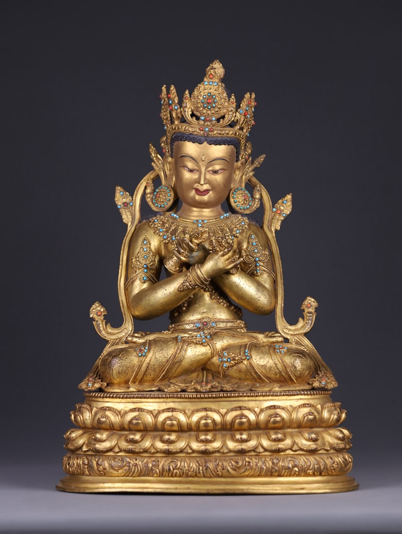 An Exquisite Gilt Bronze Inlaid Gems Buddha Statue: An Exquisite Gilt Bronze Inlaid Gems Buddha Statue Qing Dynasty, China Size:44.5cmx29.3cmx23.2cm Weight:11.09kg (The Dimensions Of All Batches Are Manually Measured.If You Need More Detailed